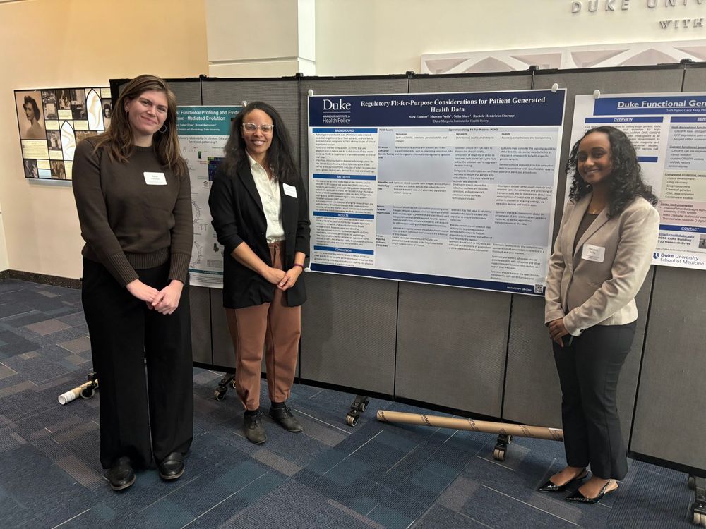 Patrick Rodriguez, Nora Emmott, Rachele Hendricks-Sturrup, and Maryam Nafie present their posters.
