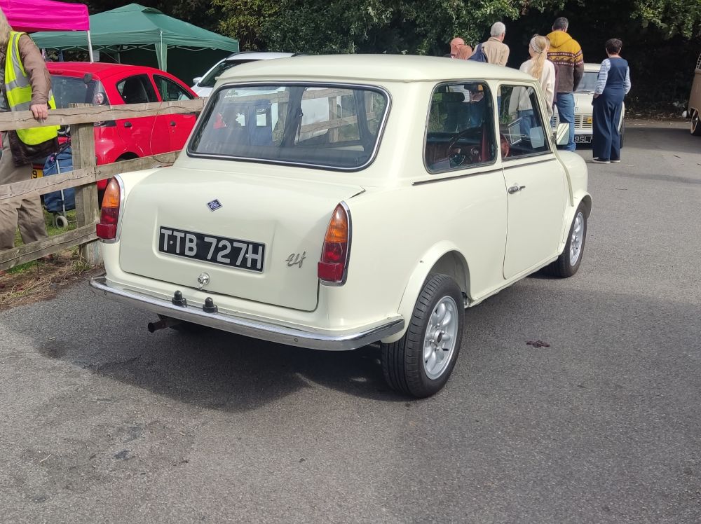 A small old white car from the rear (1969 Riley Elf)