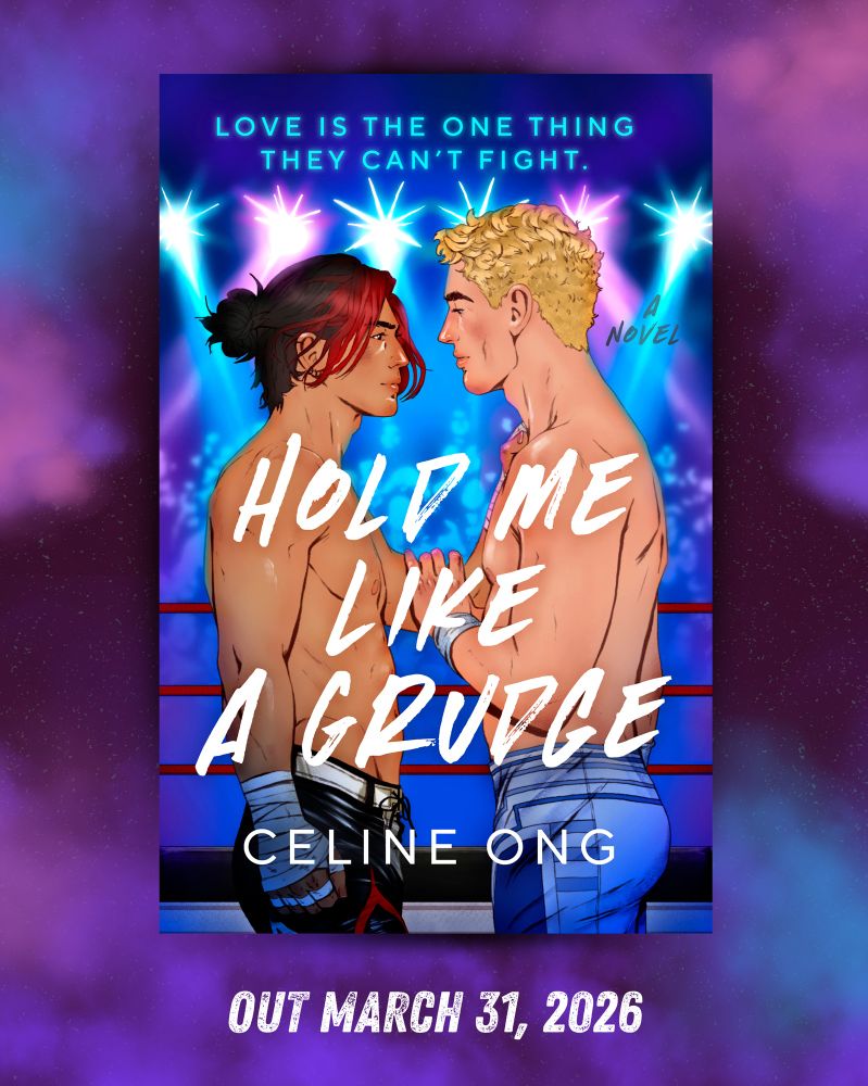 The cover art of HOLD ME LIKE A GRUDGE, a novel by Celine Ong, where two male wrestlers (to the left is an Asian man in his 20s with black hair tied up in a man bun and a red fringe cascading down his face, dressed in a pair of black wrestling tights designed to look like flames; to the right is a white man with short blond hair with slight curls at the top, dressed in white tights and blue lines coming up the side) square up in the middle of a ring. They stare at each other with a mix of fierceness and affection, and have an arm on each other. They are illuminated by pinkish, purplish, and blueish stage lights above. In the background, a faceless crowd watches them.