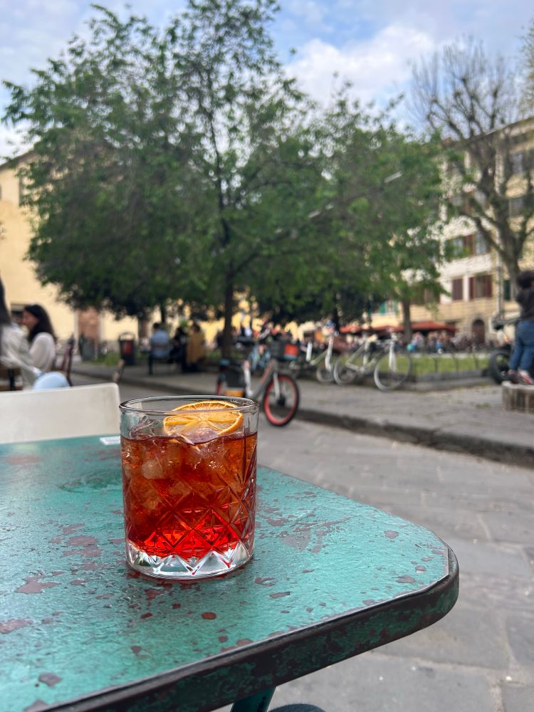 A negroni on an old desk at piazza santo spirito