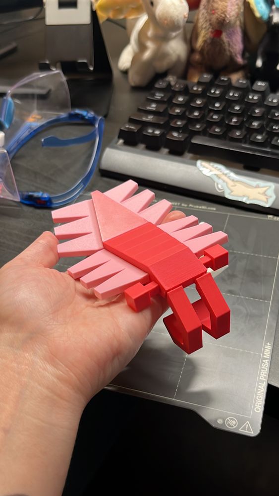 3D printed figure of a low poly anomalocaris.