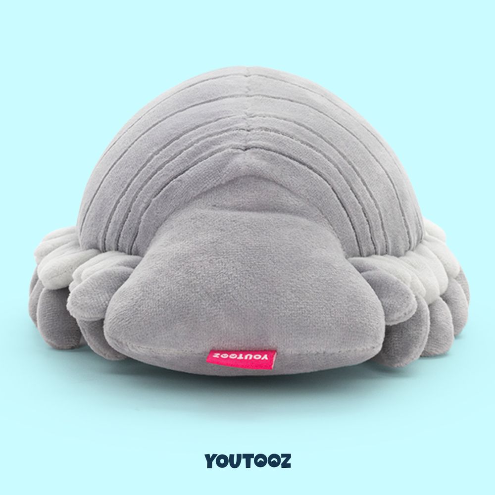 Grey, bug-like stuffed animal photographed from behind with a pink fabric tag reading, "YouTooz" attached to the tail. The name "YouTooz" is visible at the bottom of the image.