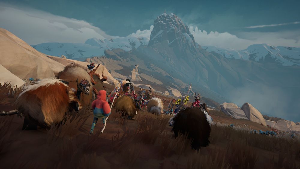 Screenshot of our upcoming game Herdling: shepherd Via is travelling with her herd of Calicorns. They're shown from the back, moving away from the viewer across a slanting mountainside. Snowy peaks rise in the distance. 