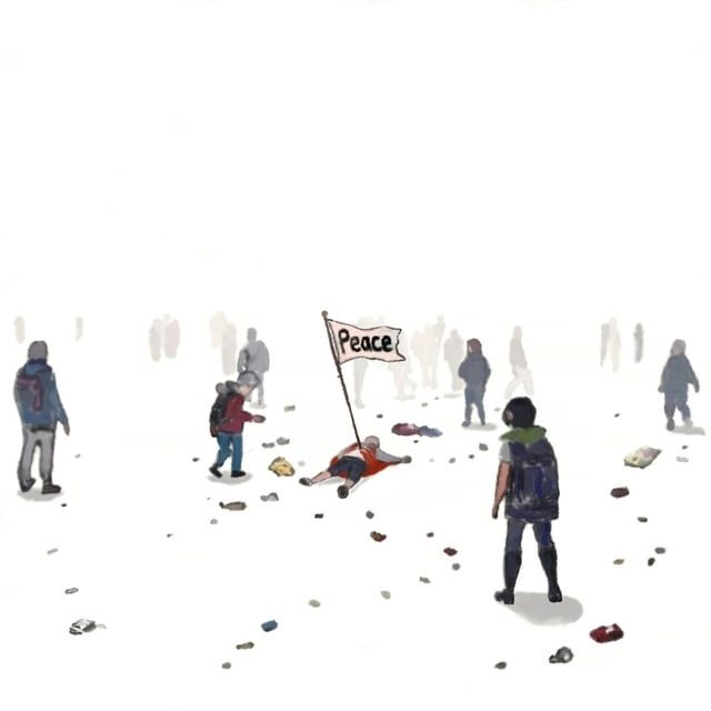 A crowd forms around a man stabbed in the chest with a Peace flag