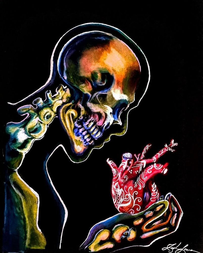 Colorful skully admires a gifted heart in hand