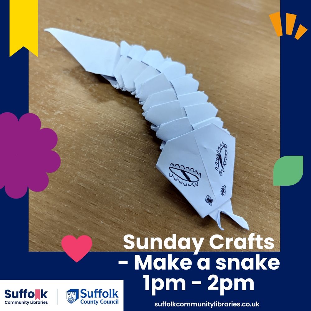 Snake made from several pieces of white paper