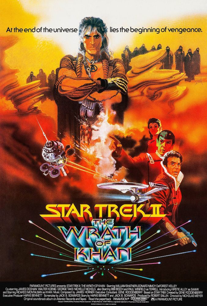 Promotional poster for Star Trek 2: The Wrath of Khan. Tagline: At the end of the universe lies the beginning of vengeance. Khan Noonien-Singh stands with arms folded in front of a ruined planet with hooded followers. The starship Enterprise is engaged in a firefight. Saavik, Spock, and Kirk in action round out the right side just above the title. 