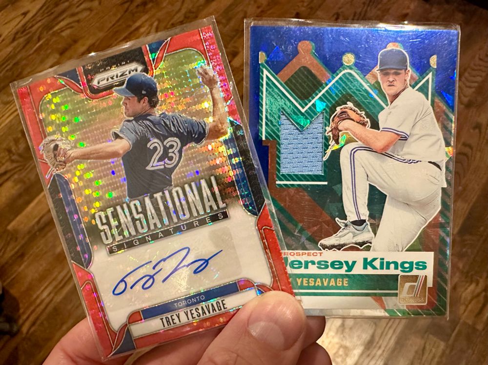 Two Trey Yesavage cards I’ve pulled recently. One is a certified autograph, a Sensational Signatures Red Pulsar parallel serially numbered #91/99 (on the back) from 2025 Panini Prizm. The other is a relic card, a Jersey Kings Blue Ice parallel from 2025 Donruss and features a small baby blue swatch of his jersey.