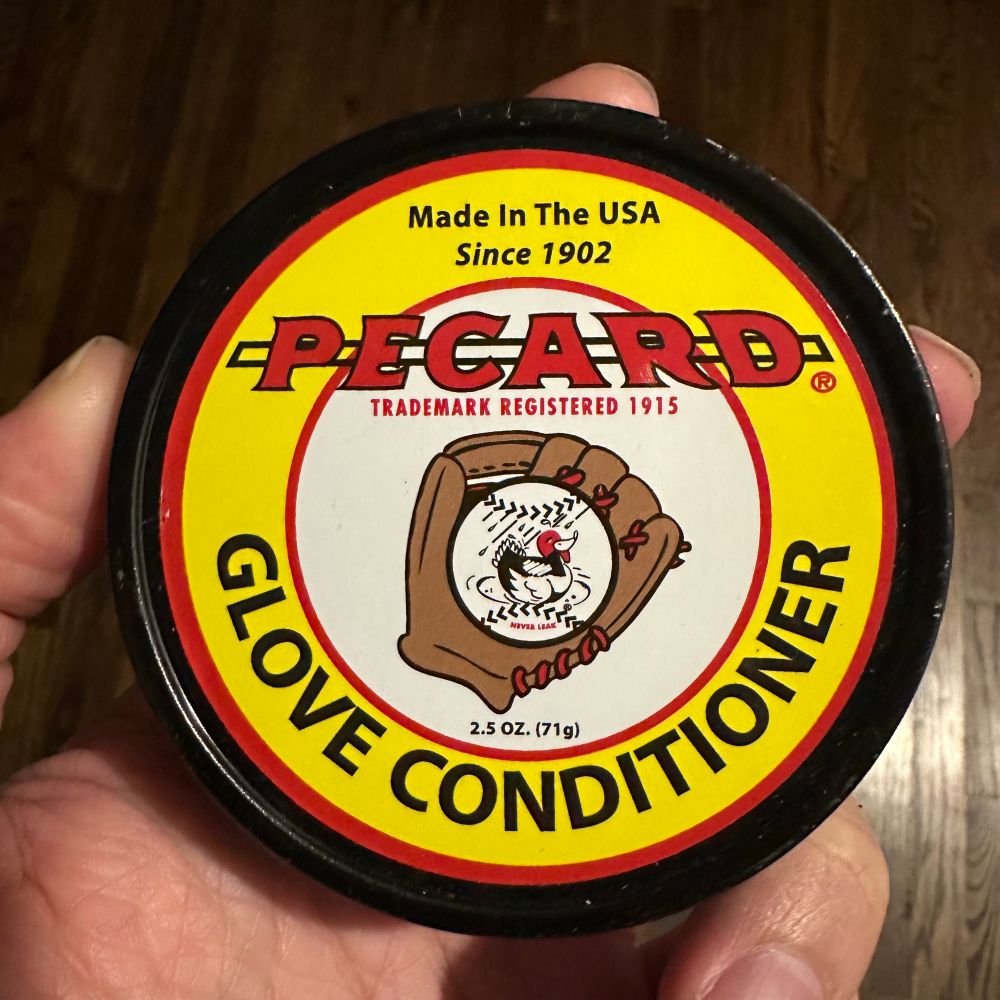 A tin of Pecard’s glove conditioner.