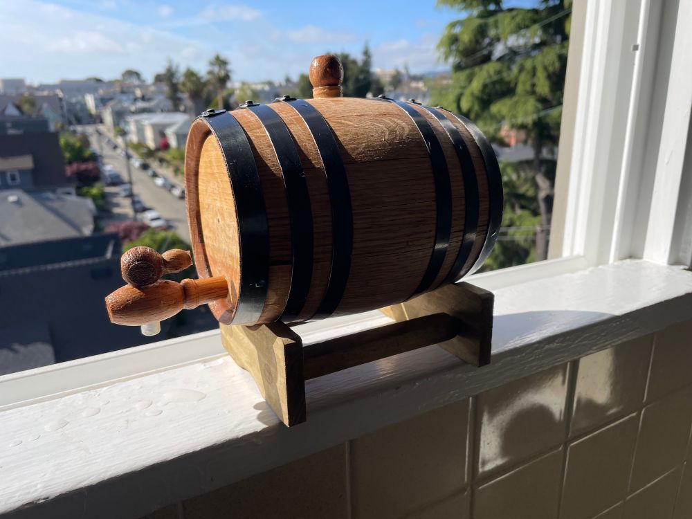 Photo of a brand new 1L oak barrel used for aging spirits 