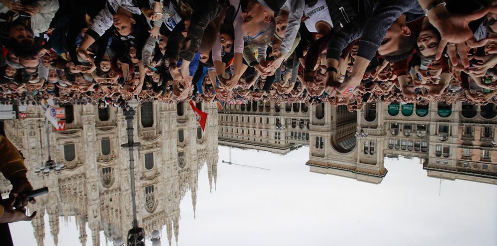 Upside down image of an anti-racism rally in Milan