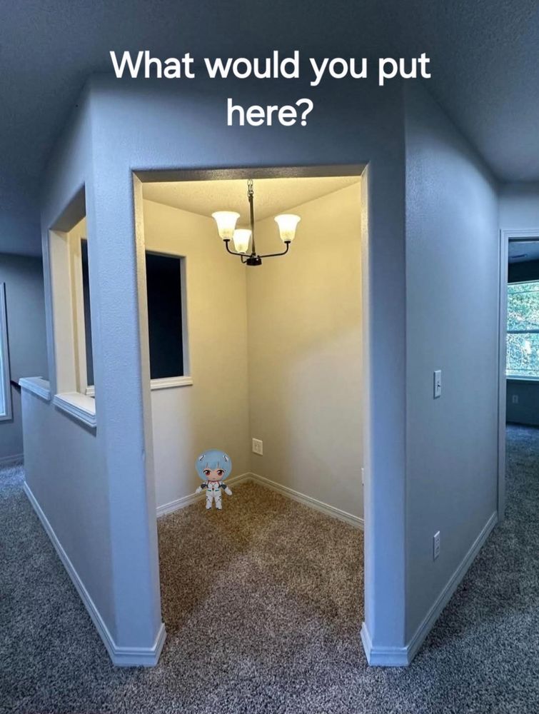 Rei plush in a small room