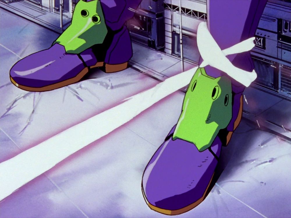Shamshel's energy tentacle appendage grabbing Unit 01's ankle