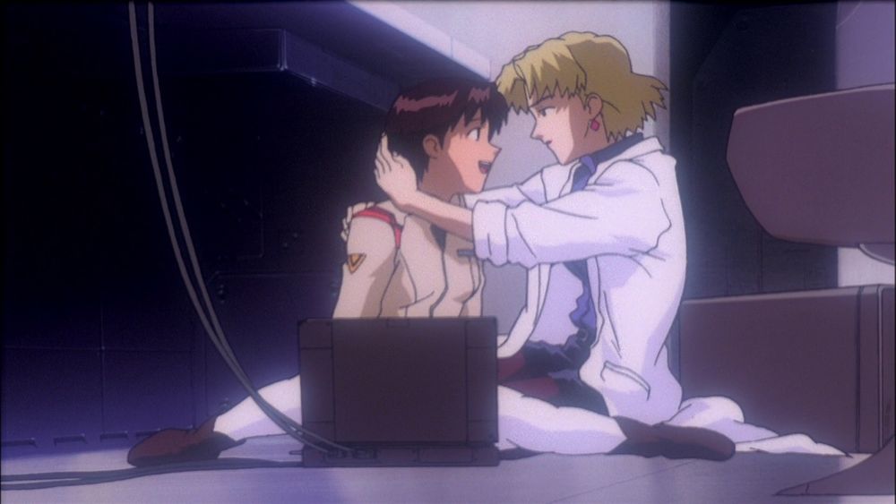 Maya smiling at Ritsuko as they're about to embrace