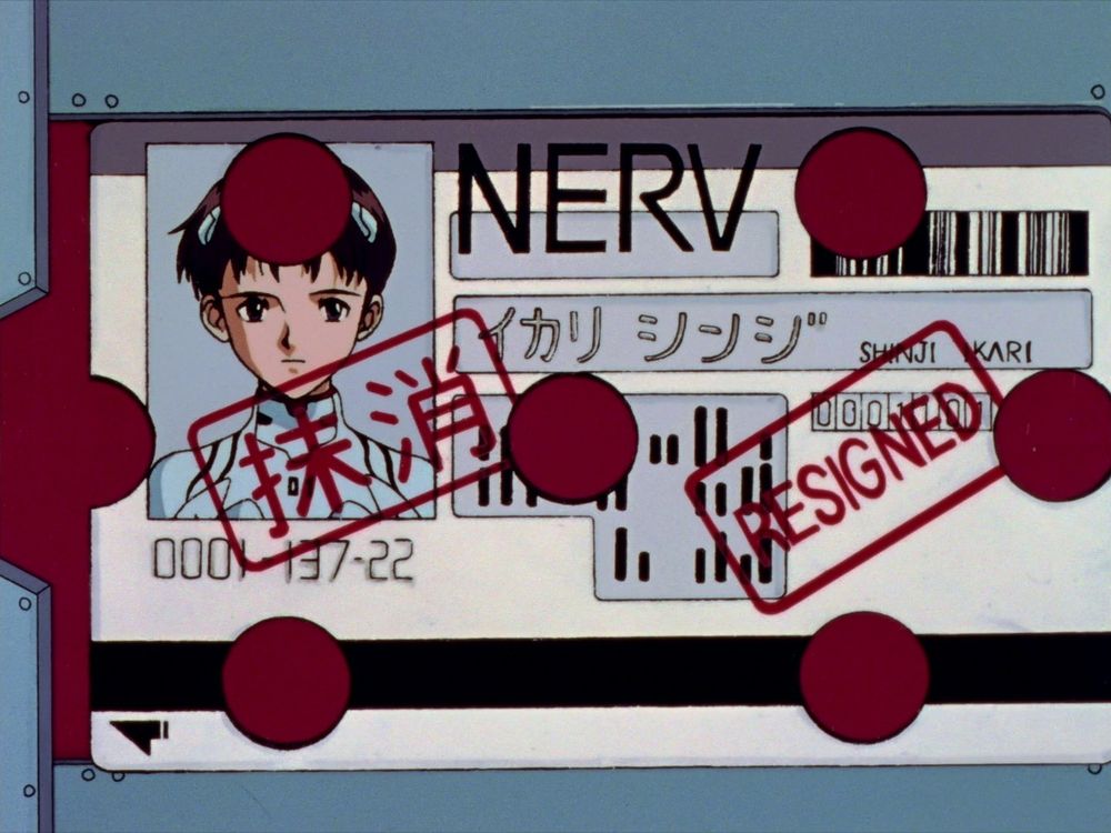 Shinji's ID card with holes punched through it