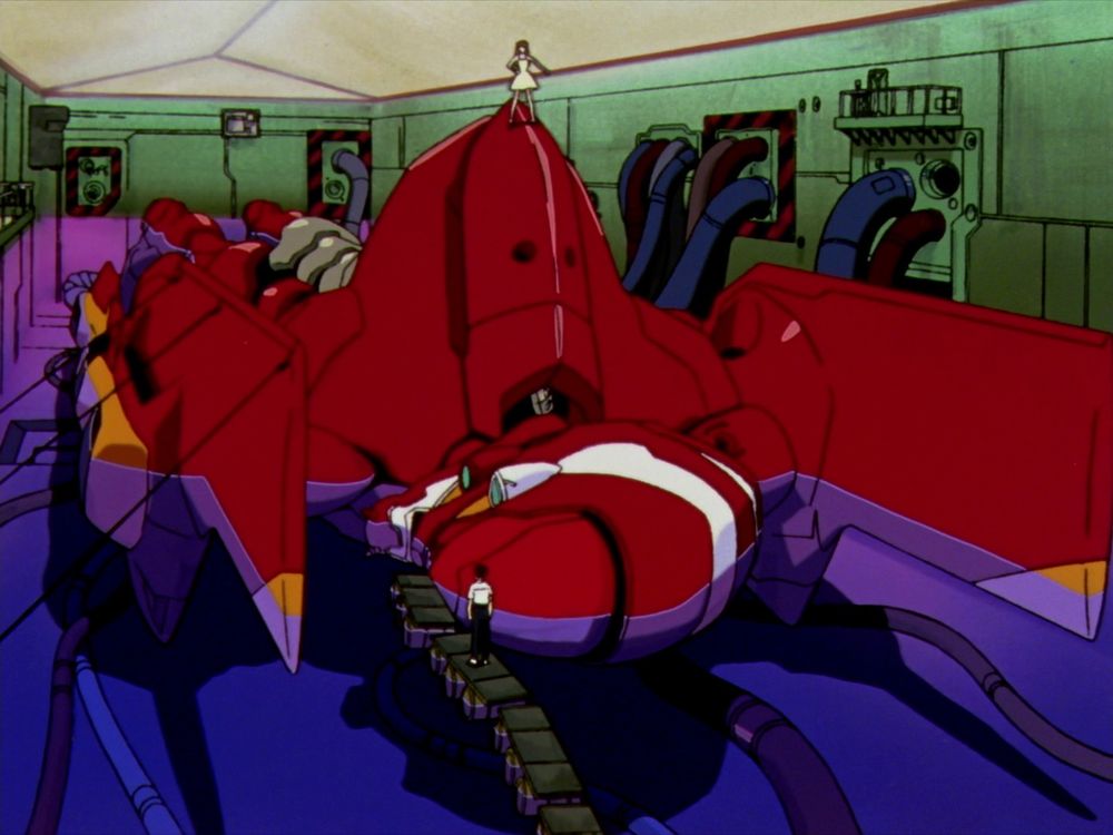 Asuka standing atop Unit 02 while Shinji looks on