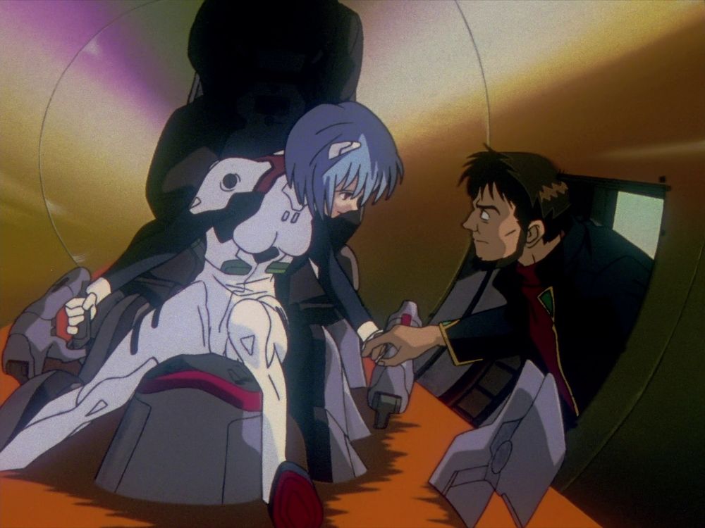 Rei and Gendo in the entry plug looking at one another