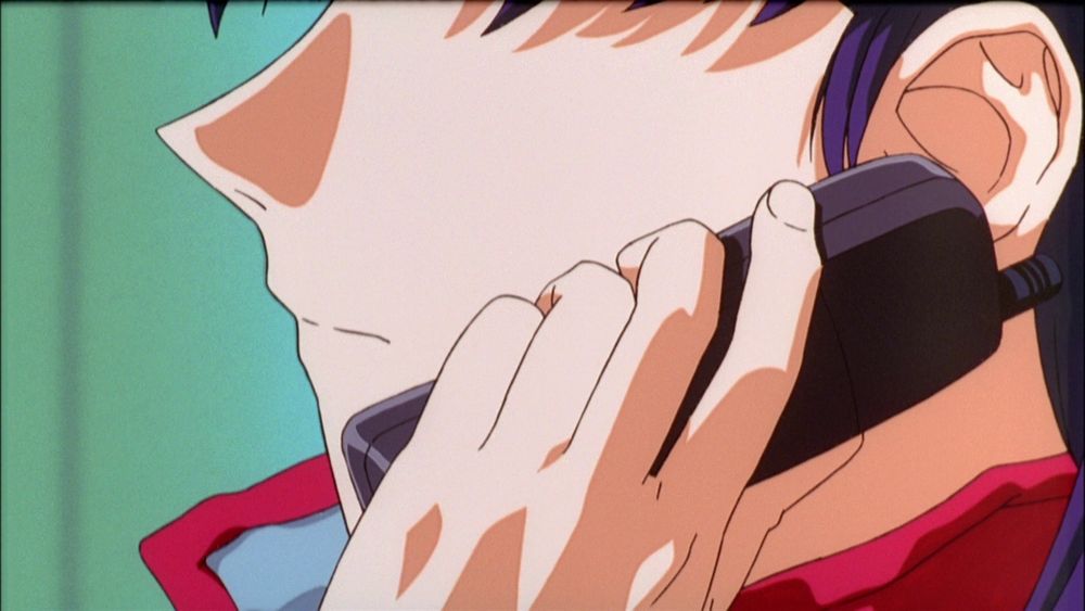 Misato talking on her phone