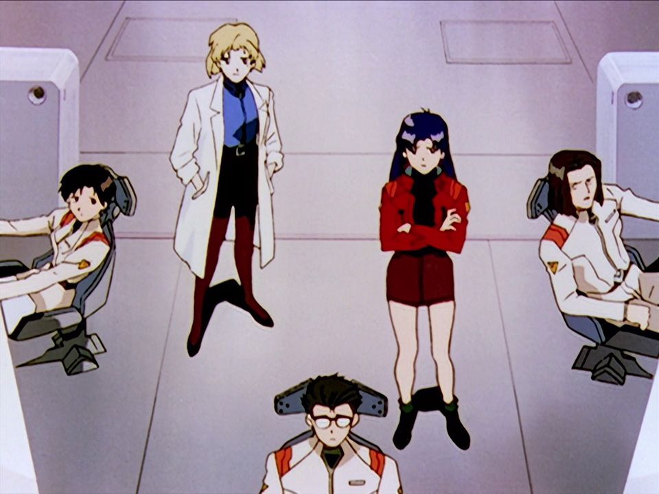 Maya, Ritsuko, Hyuga, Misato, and Aoba on the command center bridge
