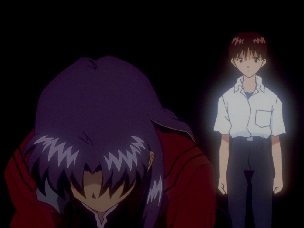 Shinji standing behind a bent over Misato