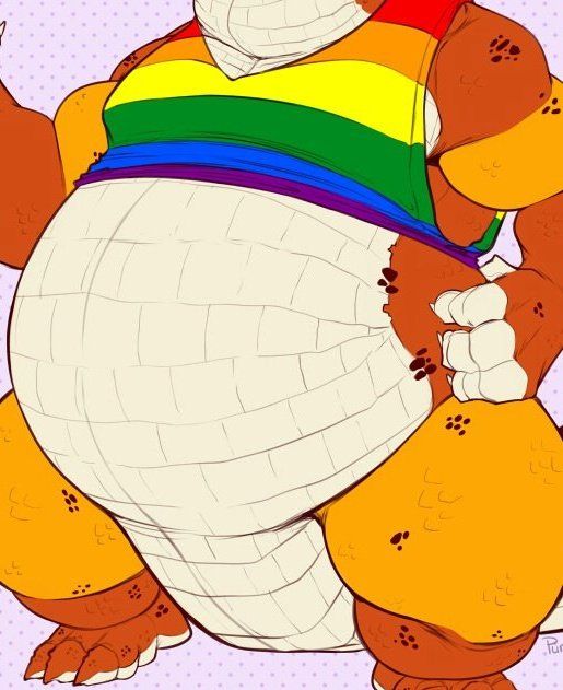 Crop of Koor as a croc, their belly is big which goes well with the pride flag shirt