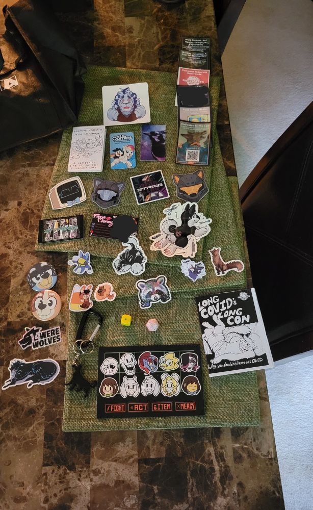 Stickers, pins, and other various goodies