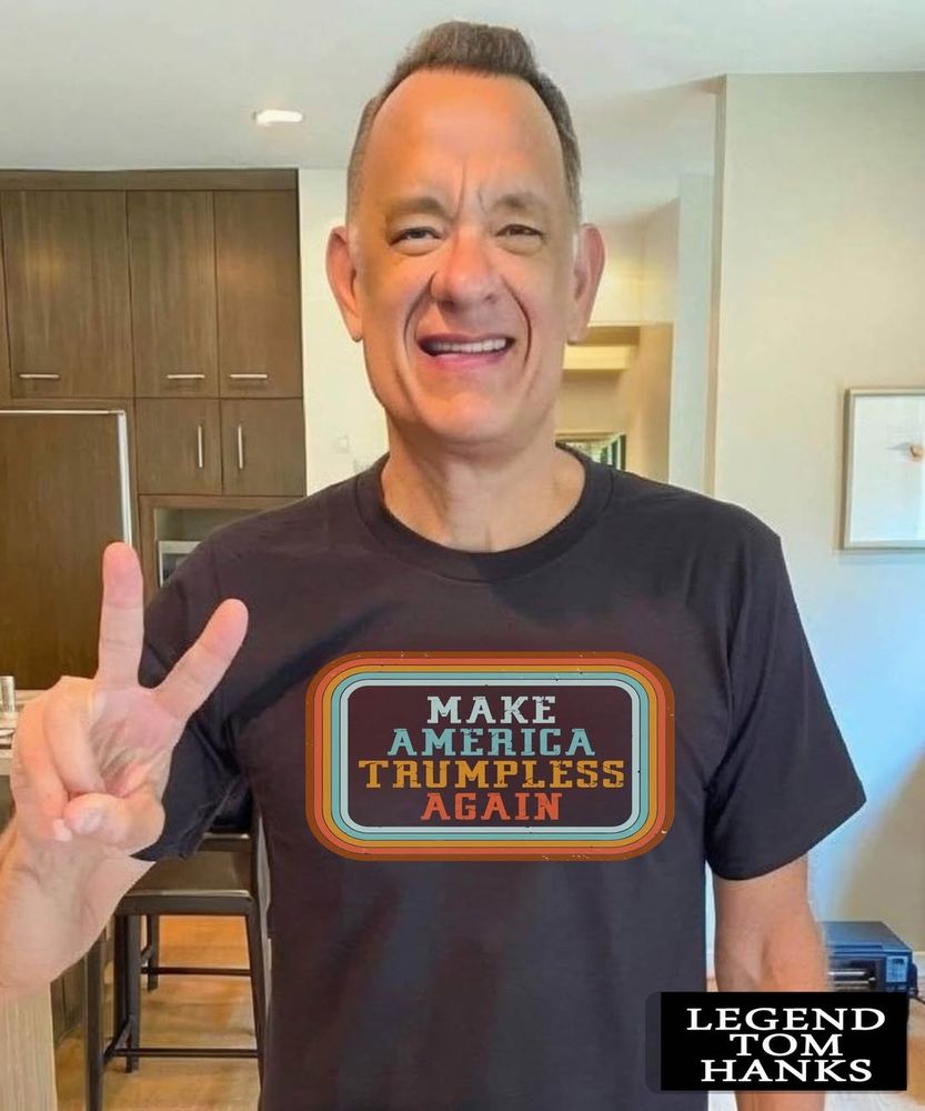 Picture of Tom Hanks with V-sign and wearing a T-Shirt sporting the legend

MAKE
AMERICA
TRUMPLESS
AGAIN