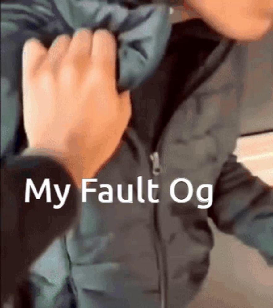 a person wearing a jacket with the words my fault og written on the bottom