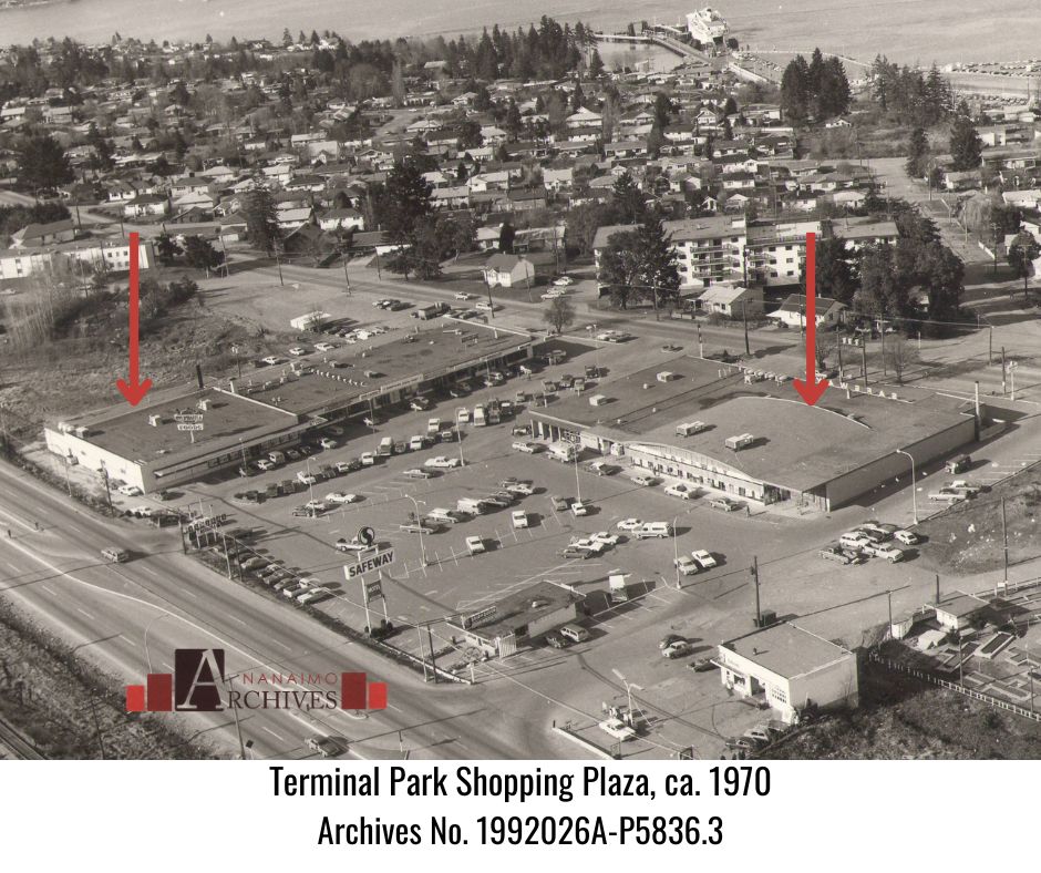 
Aerial photograph of Terminal Park Shopping Plaza in Nanaimo British Columbia around 1970.  Shows buildings, cars, parking lot and roads.