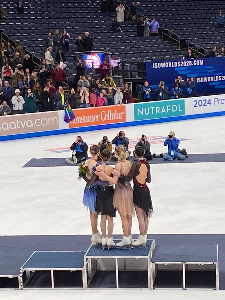 The US women’s champions hugging on the medals stand