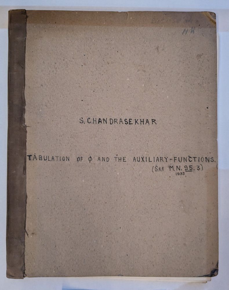 The buff-coloured cover of a manuscript inscribed with the name S. Chandrasekhar and the title 'Tabulation of ϕ and the Auxiliary-functions (see M.N. 95.3 1935)'. This manuscript was deposited in the Royal Astronomical Society library and archive by Subrahmanyan Chandrasekhar. The tables accompanied Chandrasekhar’s paper “The Highly Collapsed Configurations of a Stellar Mass (Second Paper)” which was published in Volume 95, Number 3, of Monthly Notices of the RAS, in January 1935. The paper was read at a meeting of the Society on 11th January 1935. 
