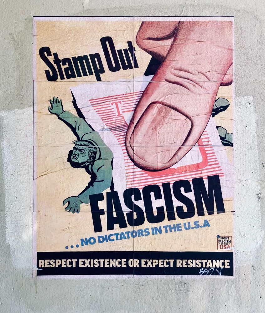 Poster that reads stamp out fascism with a thumb pressing down 