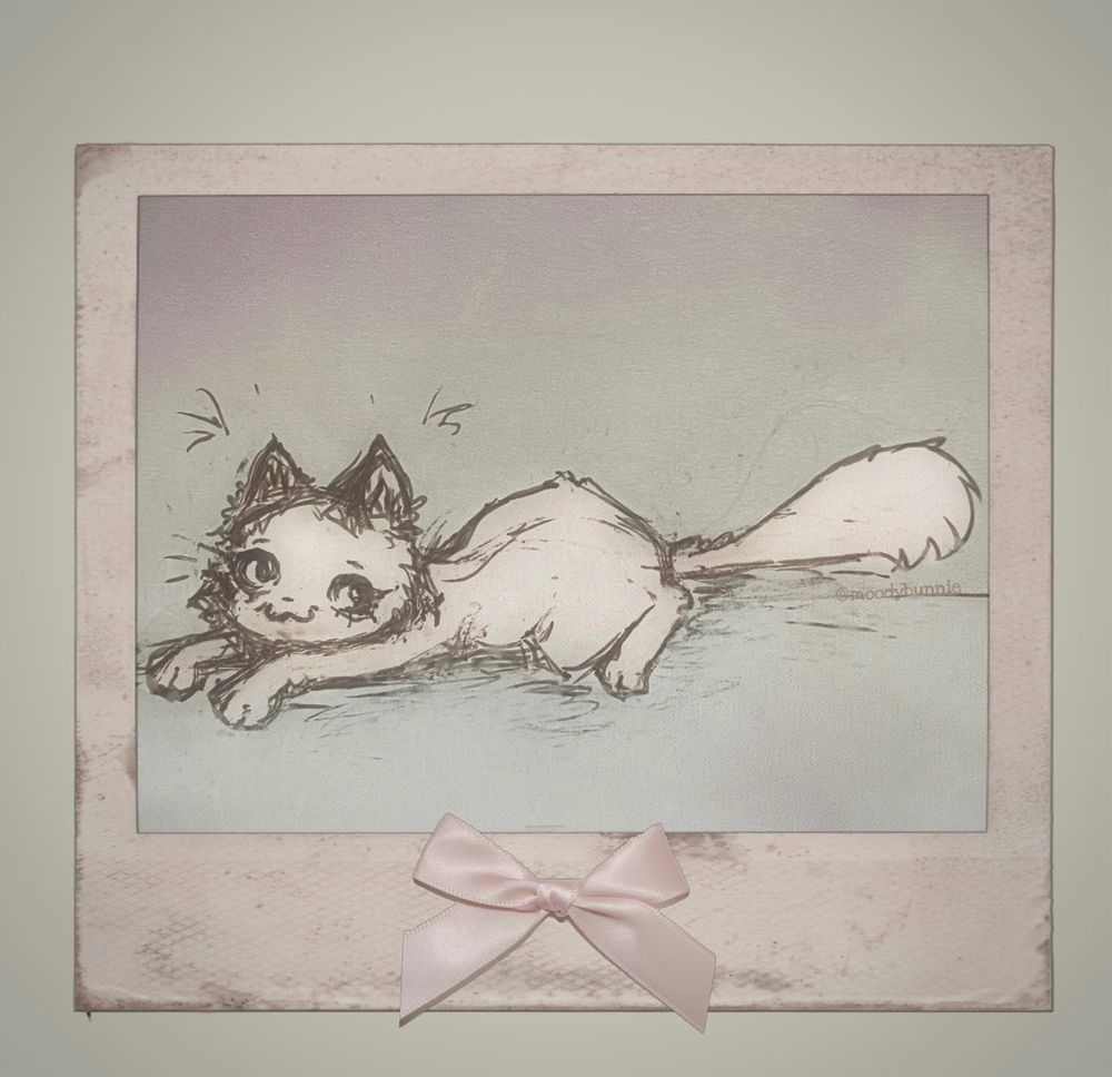 a digitally colored / collaged pen doodle of a fluffy cat laying down

it’s been filtered to add a pale, pastel, grainy overlay

A (real) blank polaroid photo was edited as a border, a (real) satin bow was edited below the laying cat 