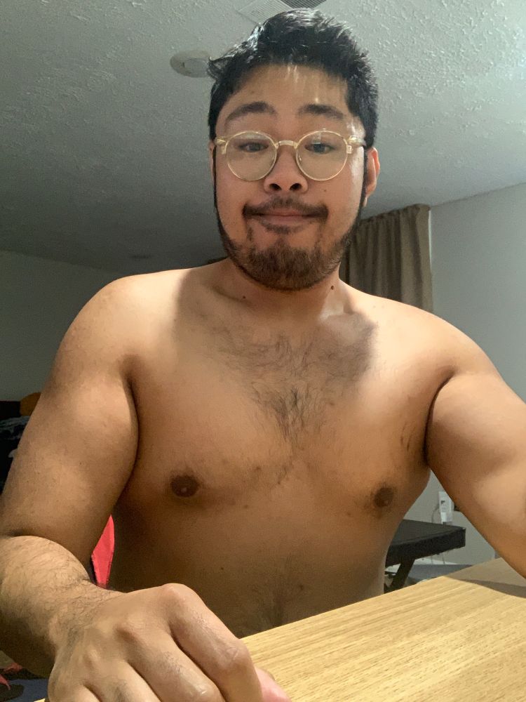 Image of Ray, shirtless after a pull day workout. 