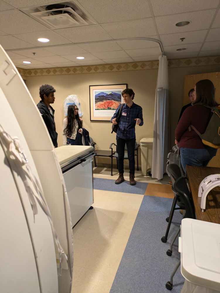 PI showing students mock MRI room