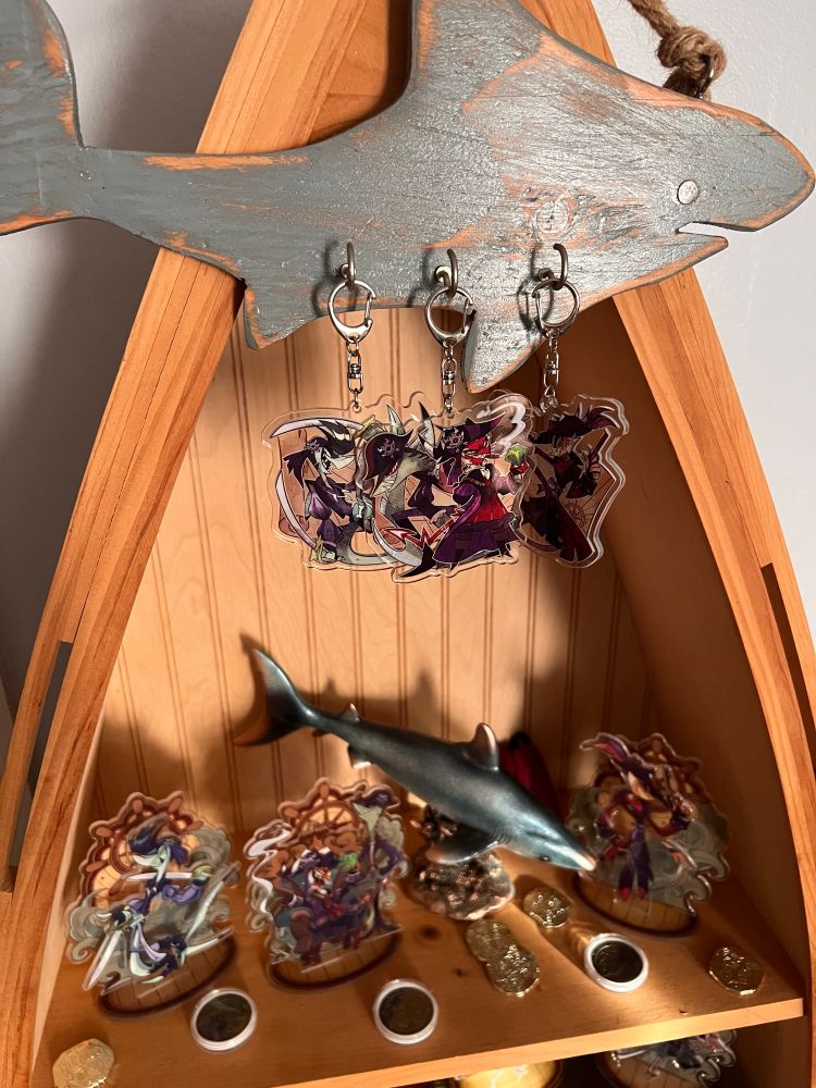 A collection of #HelluvaBoss merch from their 2025 summer drop. Pirate themed.

#HelluvaBossCrimson
#HelluvaBossAlessio
#HelluvaBossStriker
#HelluvaBossChaz