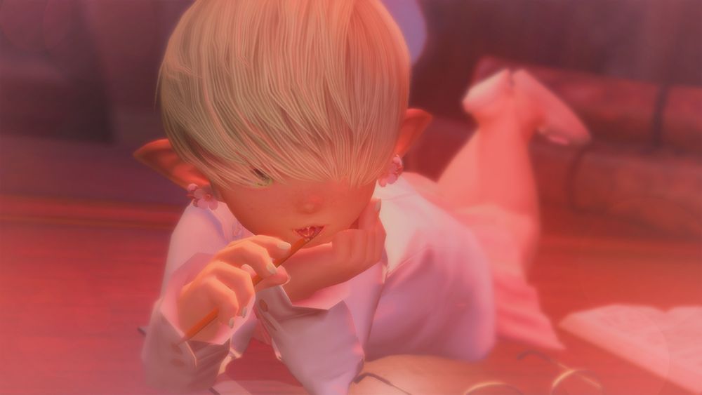 olyver posing sinfully atop a desk, gnawing on the end of a pencil. what is he doing dude