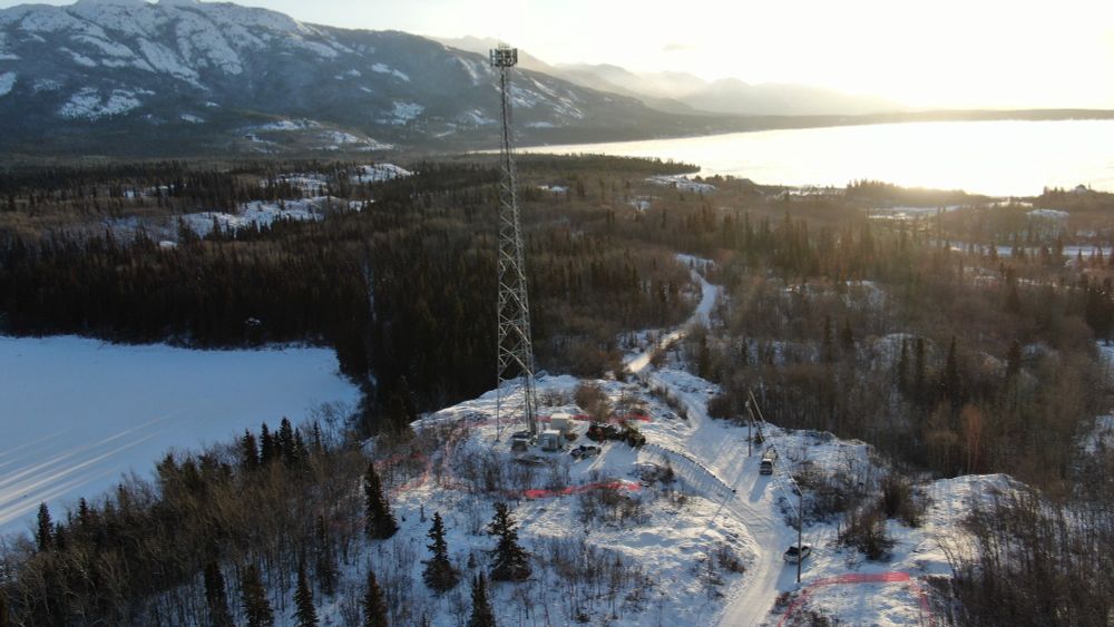 The new cell tower in Taku River Tlingit First Nation, with Atlin Lake and mountains in background.