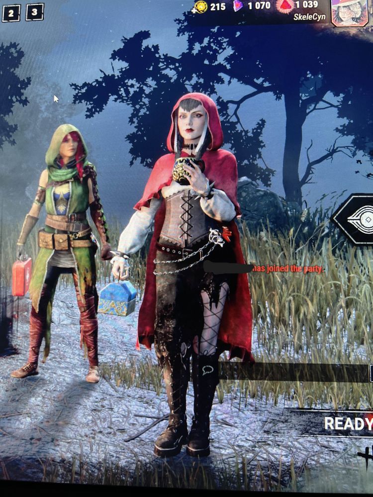 Sable in her Red Riding Hood outfit, in the lobby of Dead by Daylight.