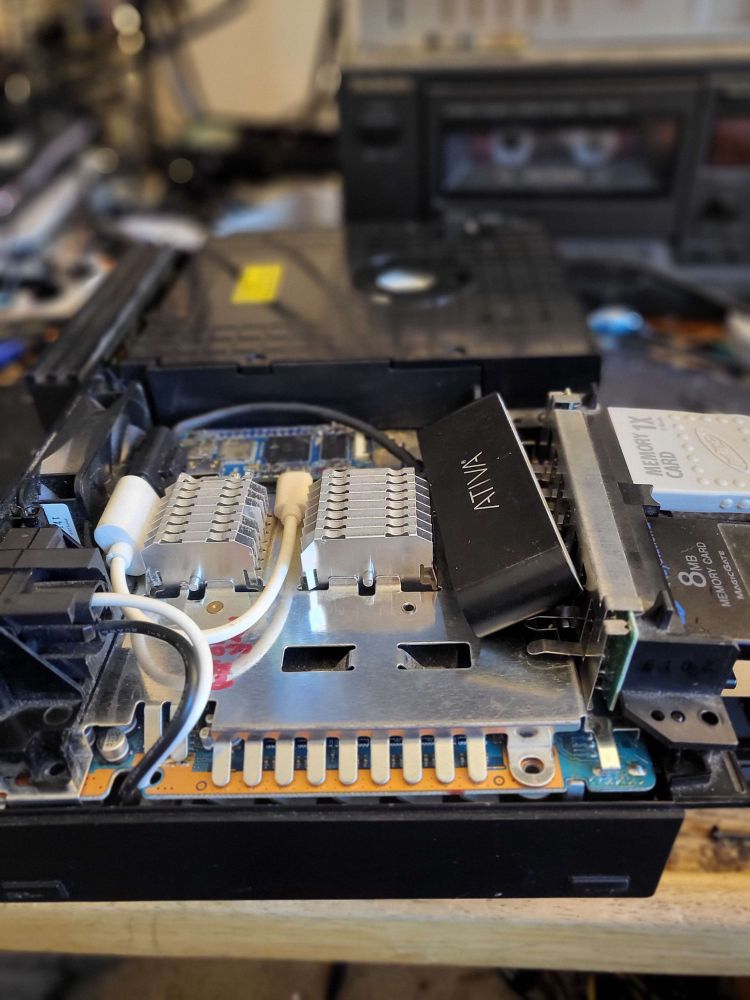 the inside of a playstation2 where this mod will be installed.