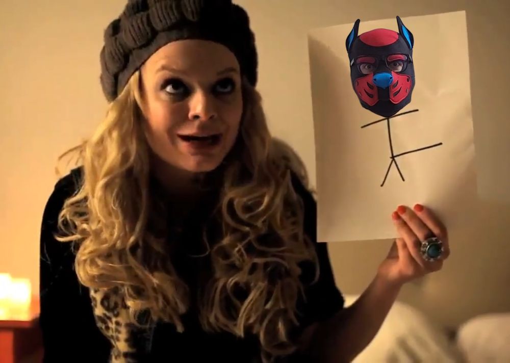 Legendary actress Elaine Carroll from her 2010 series Very Mary Kate. As Ashley, she holds up a stick figure with a very big stick between his legs.