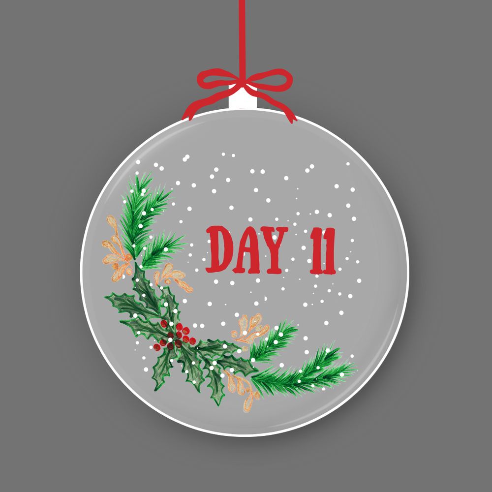 grey bauble with day 11 written inside in red