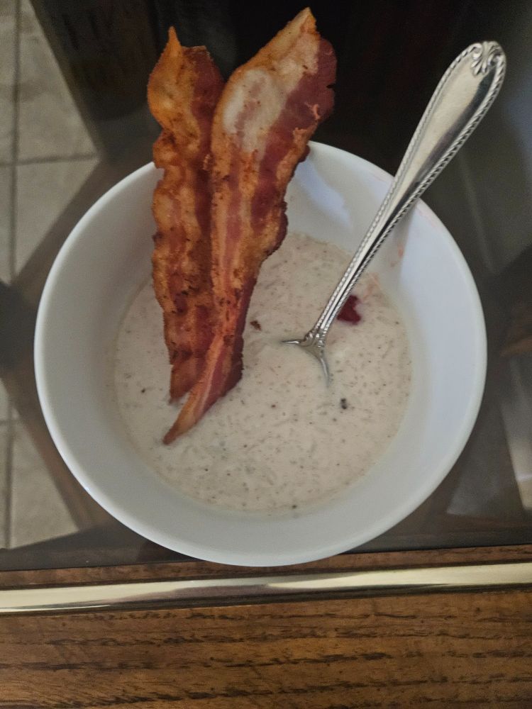 Second breakfast - rice pudding with bacon, raisins, and cherries