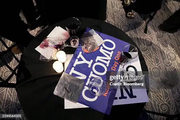 Cuomo ready on day one sign in a pile of abandoned party trash 
