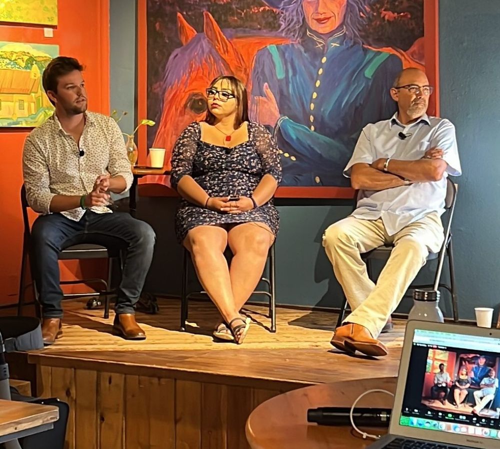 Journalist Joshua Bowling, left, moderates a discussion with Lexi Pina, who was formerly detained in the Bernalillo County juvenile detention center, and Albino Garcia, a prominent youth justice advocate at Collected Works Bookstore and Coffee Shop in Santa Fe, NM.