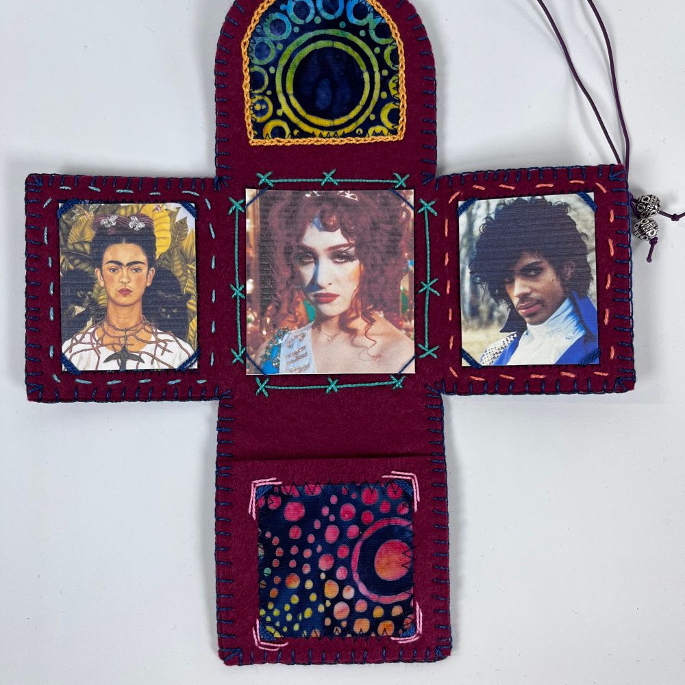 This pocket altar is made of dark red felt. It features three panels with artists I really admire. The center panel is Chappell Roan. The two side panels are Frida Kahlo and Prince. 