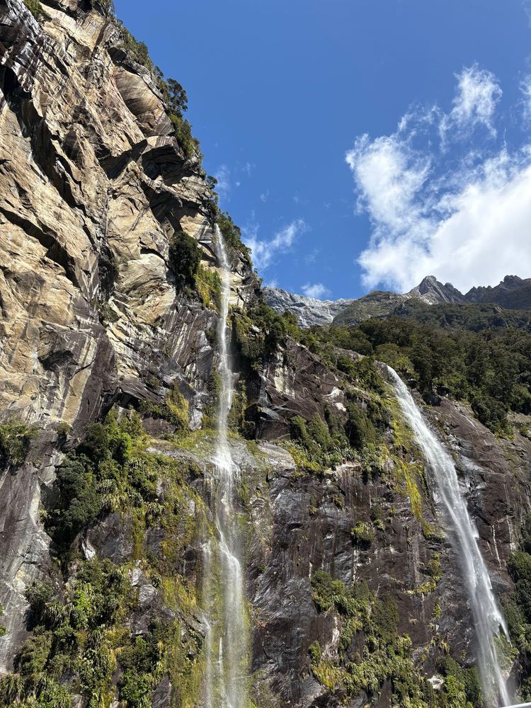 Photo of a high cliff with waterfalls 