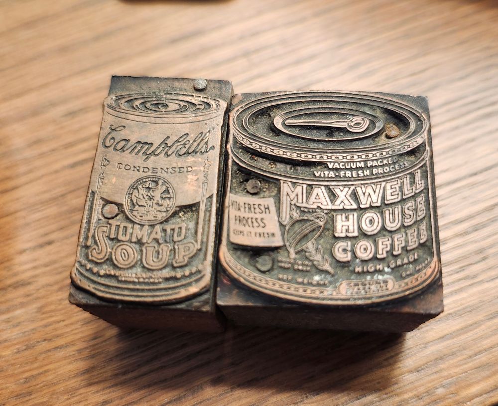 The same image as before but mirrored, so that the images of the products the stamps are advertising appear almost the way their stamped image would appear.