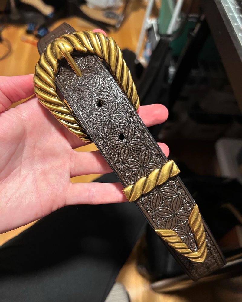 An ornate belt and buckle
