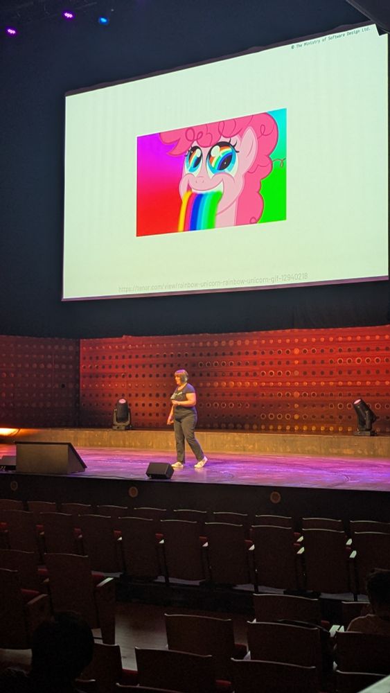 A gif of a unicorn vomiting a rainbow 